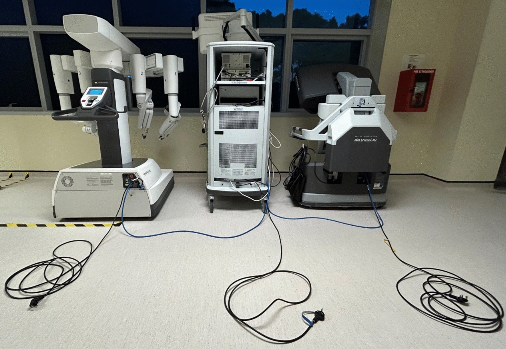 A narrative review of the Medtronic Hugo RAS and technical comparison with the Intuitive da Vinci robotic surgical system