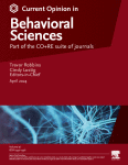 The interplay between subcortical and prefrontal brain structures in shaping ideological belief formation and updating